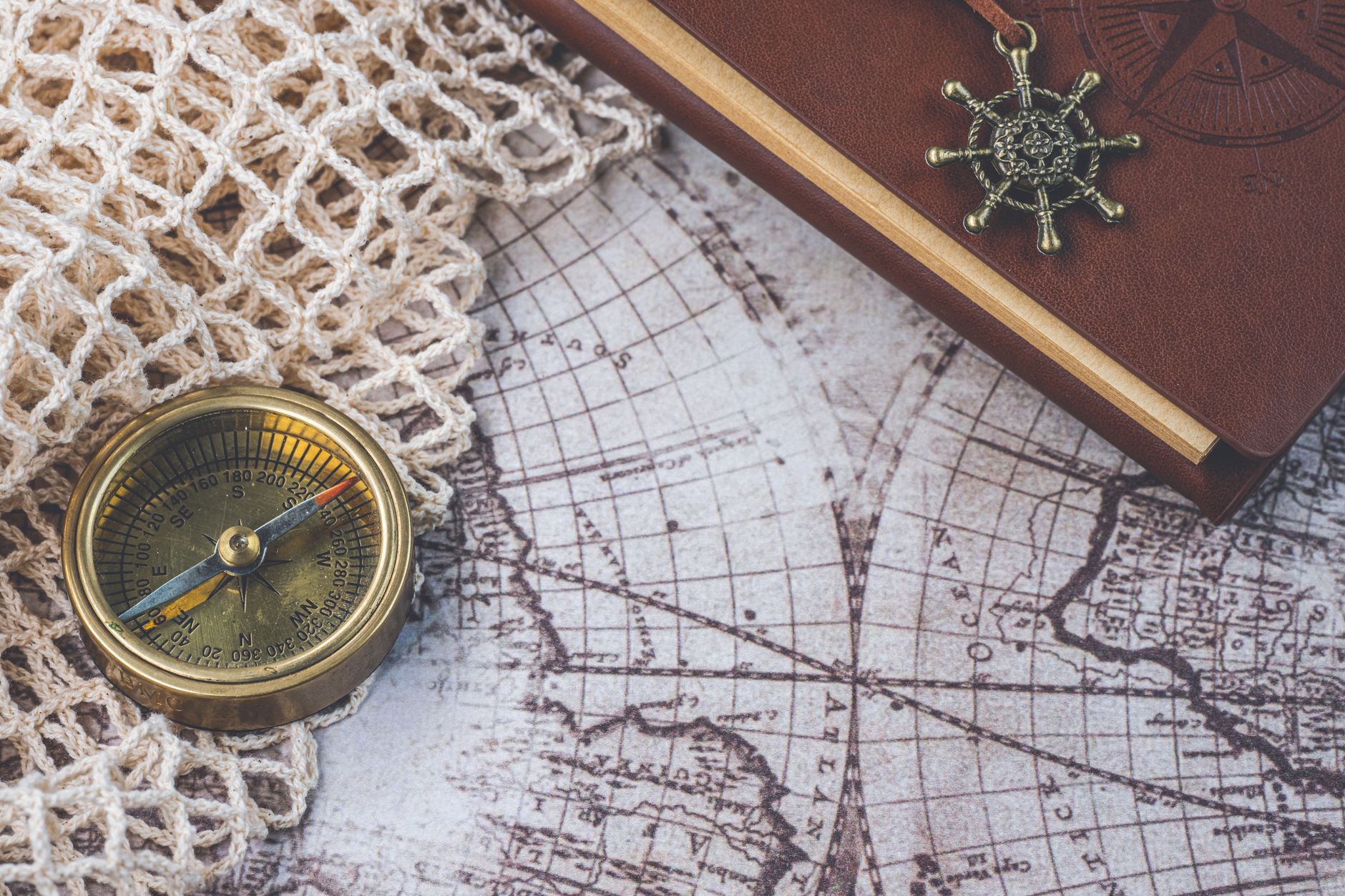 Custom itinerary planning map and vintage compass